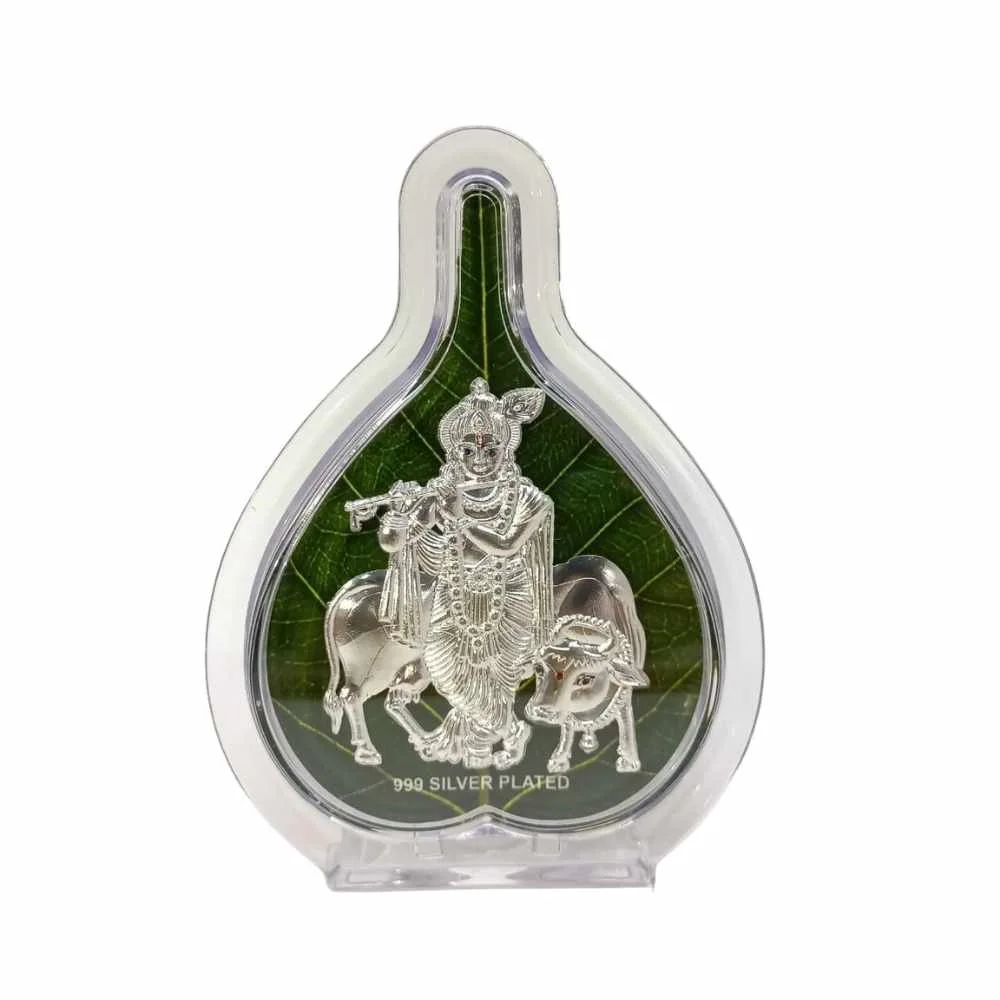 Krishna with cow silver plated pan shaped photo frame